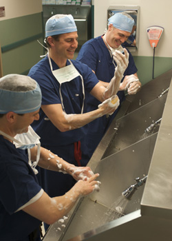 photo of surgeons washing hands before surgery